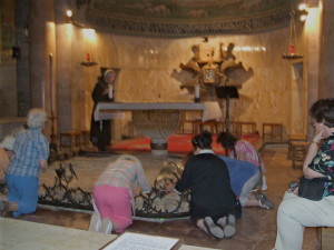 Some of our group praying on the rock.